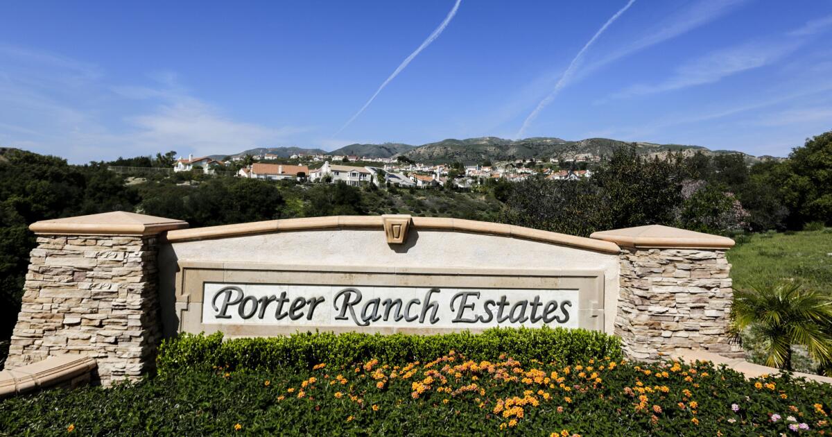 Entrance sign for Porter Ranch Estates, framed by the Santa Susana foothills
